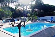 Casa con jardín y piscina en la Praia das Maçãs Lisboa